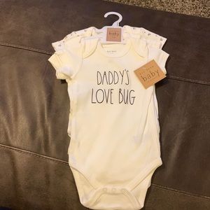 Brand new with tags - Rae Dunn baby onesies, pack of 3.